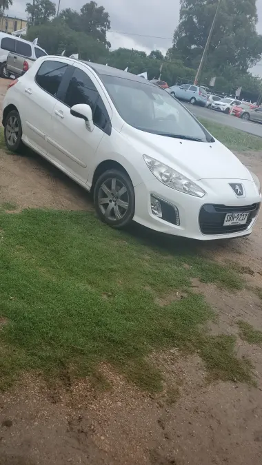 Peugeot 308 2013 — foto 2