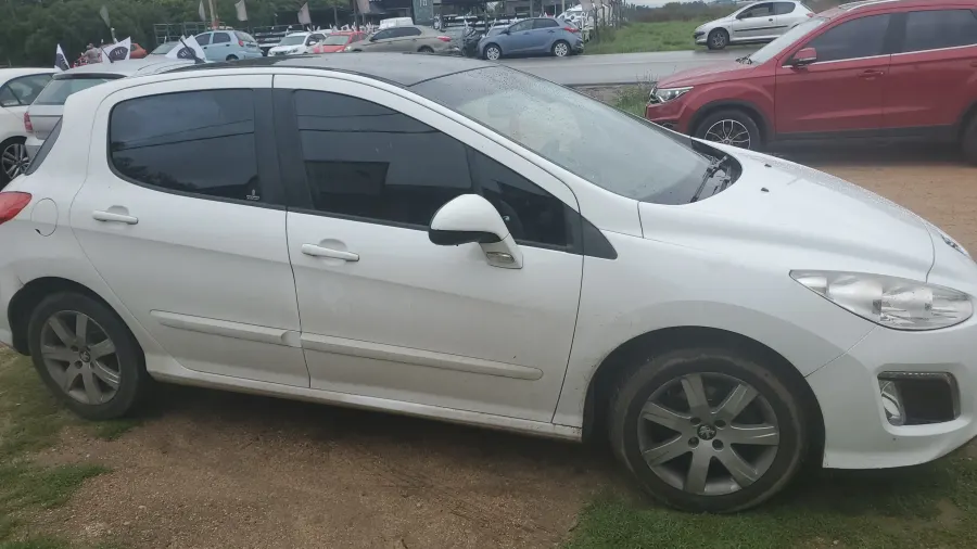 Peugeot 308 2013 — foto 3