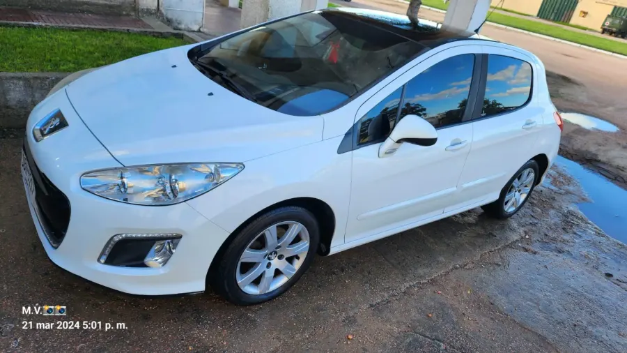 Peugeot 308 2013 — foto 4