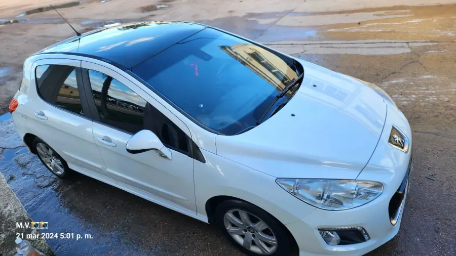 Peugeot 308 2013 — foto 5